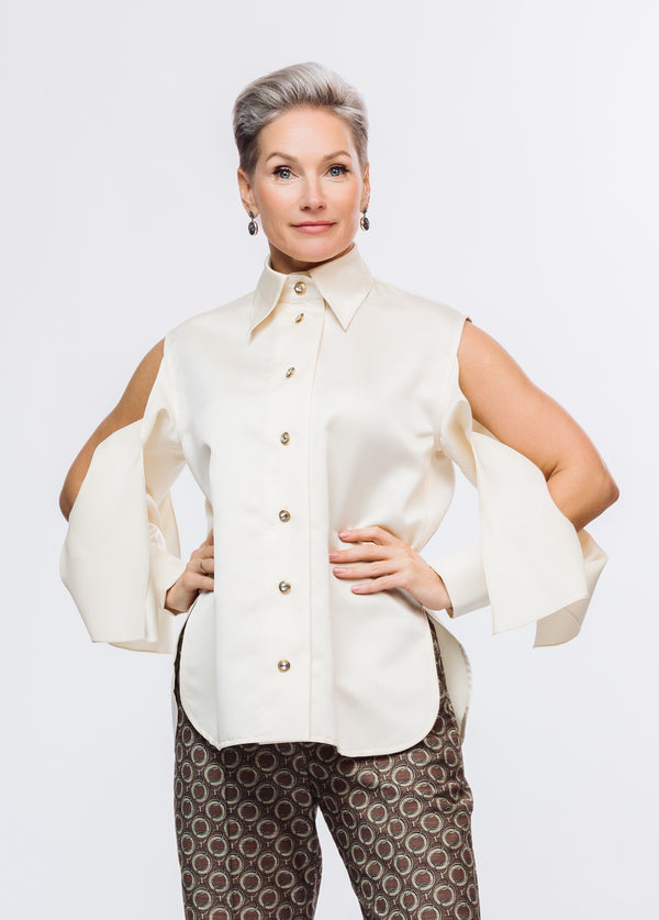 BLOUSE WITH TORN SLEEVES